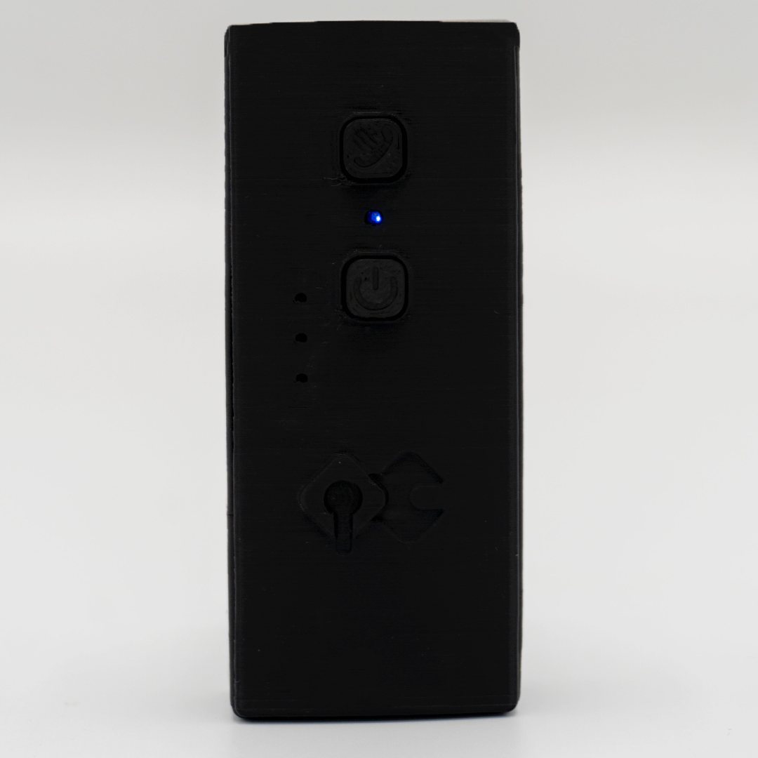 Front of the QuickComm Bridge Node with the status LED lit between its two buttons