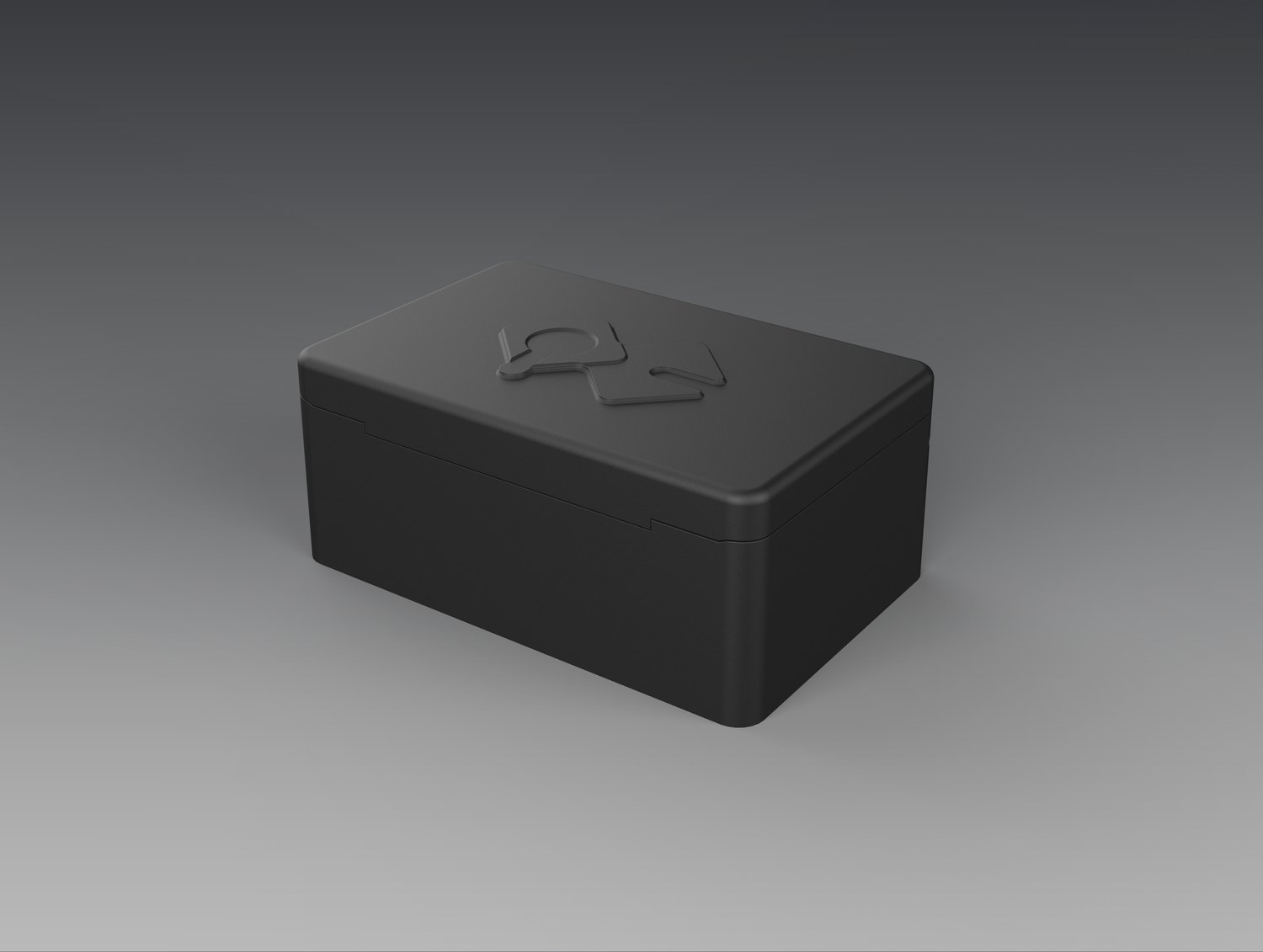 The QuickComm charging dock closed, a compact matte-black case with the QuickComm logo embossed on the lid