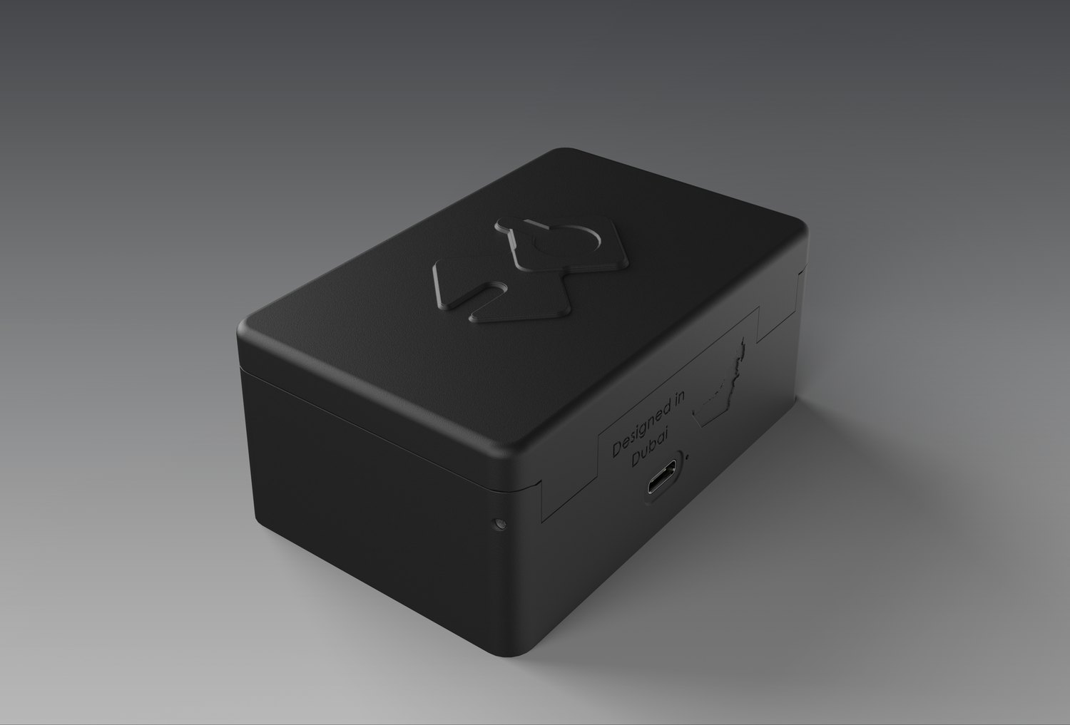 Rear three-quarter view of the closed QuickComm charging dock, showing the hinge side of the case
